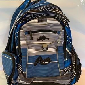 ROOTS backpack. NEW, never used. Blue with accent stripes. Key holder intact.